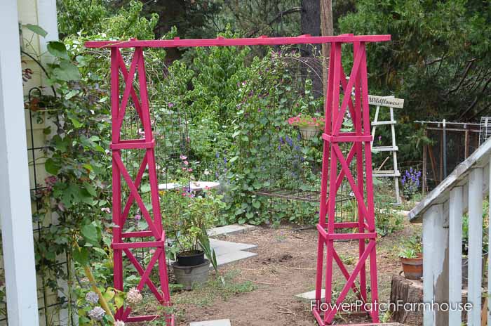 Build yourself this fabulous arbor from 2 obelisks and diy ladder. Great weekend project that adds that special touch to your garden! 
