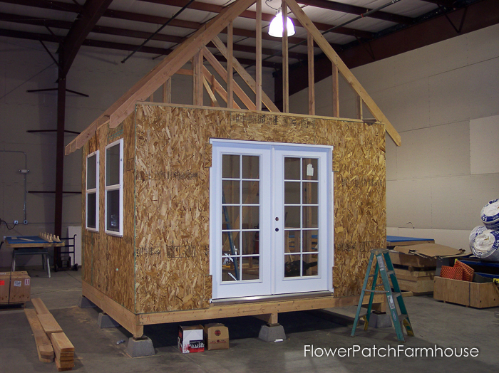 How to Build a Gorgeous She Shed, complete with link to step by step plans. Great for a home office, glorified garden shed or as an art / craft studio. Come see our photo album of building this one. FlowerPatchFarmhouse.com