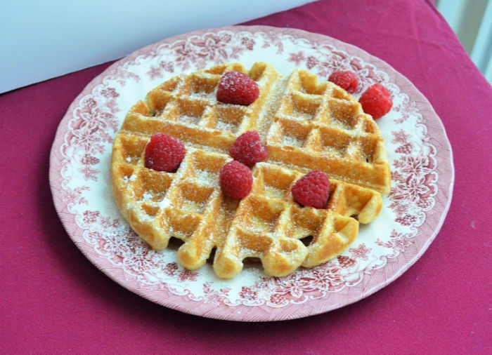 Home made waffle from scratch with raspberries