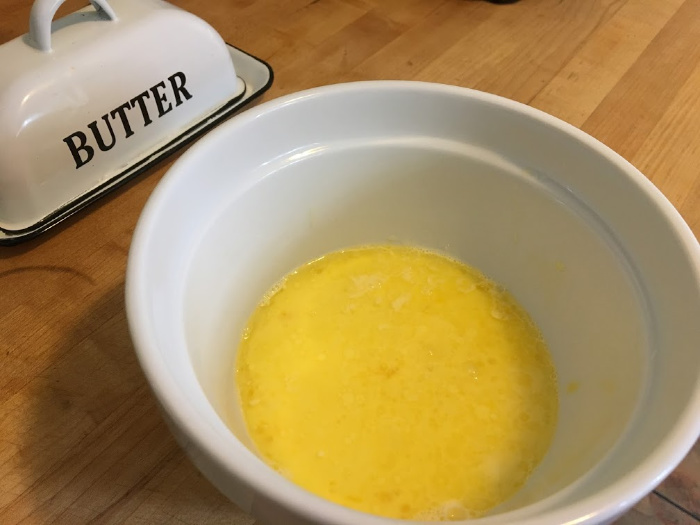 butter floating on top of waffle batter