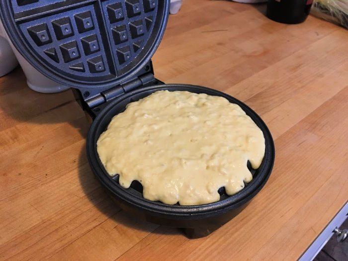 waffle batter in waffle iron