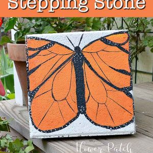 concrete paver painted with a monarch butterfly with text overlay, DIY painted stepping stone, easy step by step, Flower Patch Farmhouse