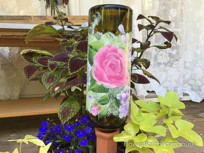 Terra Cotta Plant Waterer & Painted Bottles