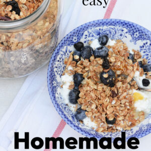 blue patterned bowl filled with delicious homemade granola over cottage cheese, jar of more granola in jar behind, text overlay reads: deliciously easy homemade granola!
