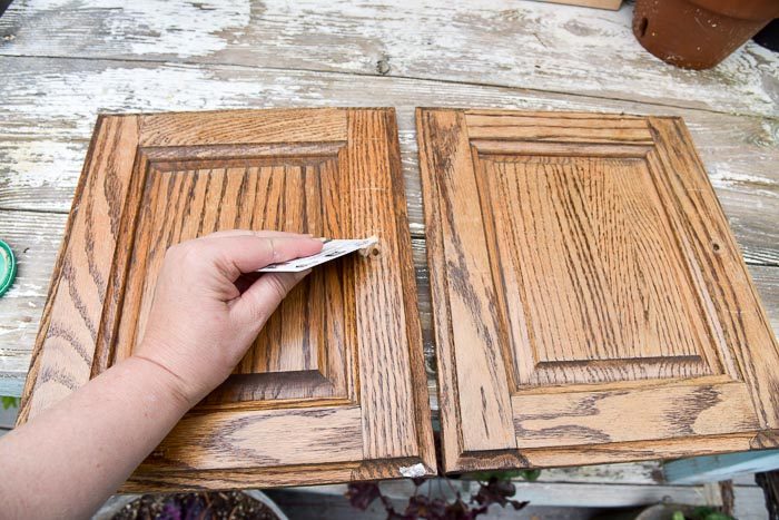 Filling hold with wood filler in cabinet door, DIY frames from cabinet doors.