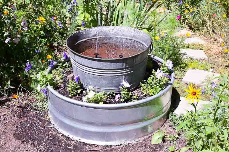 DIY planter with solar fountain tub, flower patch farmhouse