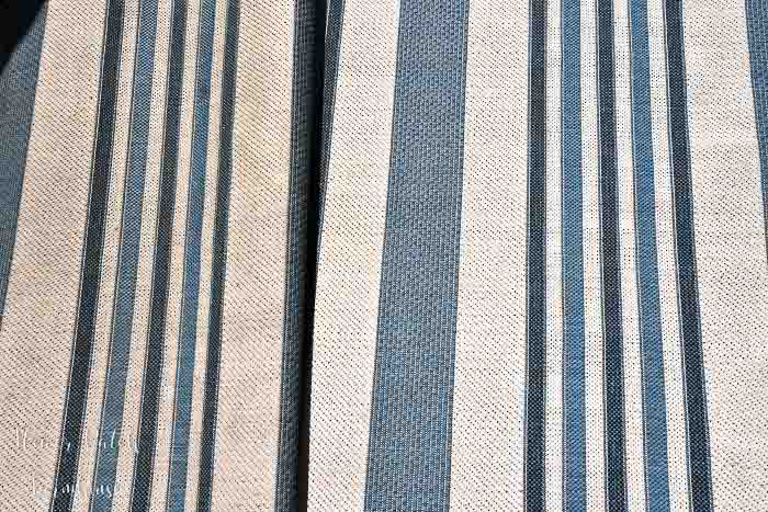 close up of outdoor rug, blue stripe