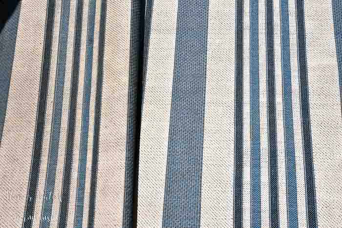 close up of outdoor rug, blue stripe