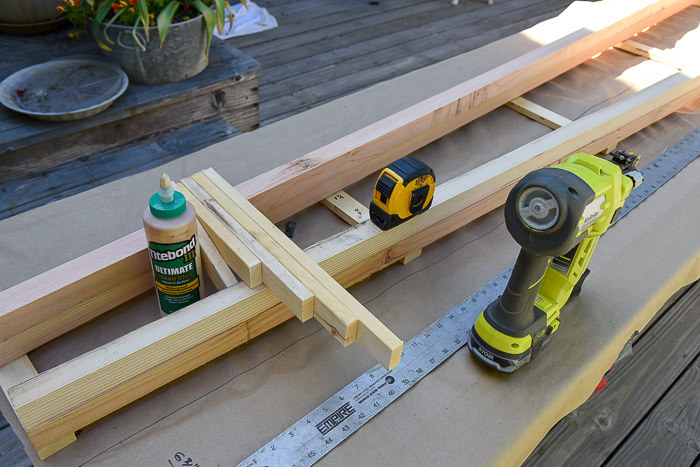 lumber and tools to build diy tomato support 