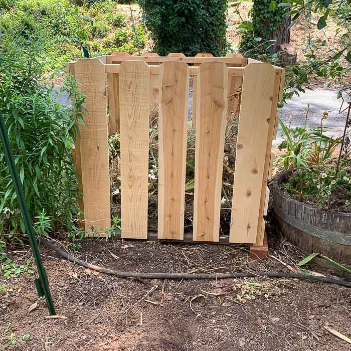 DIY compost bin in place in the garden looking good