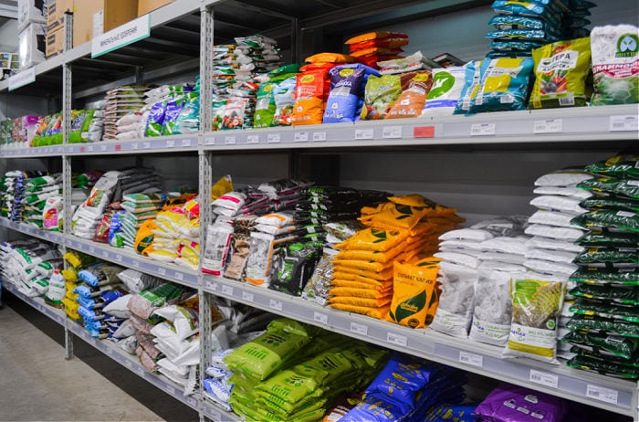 Bags of fertilizer on store shelf