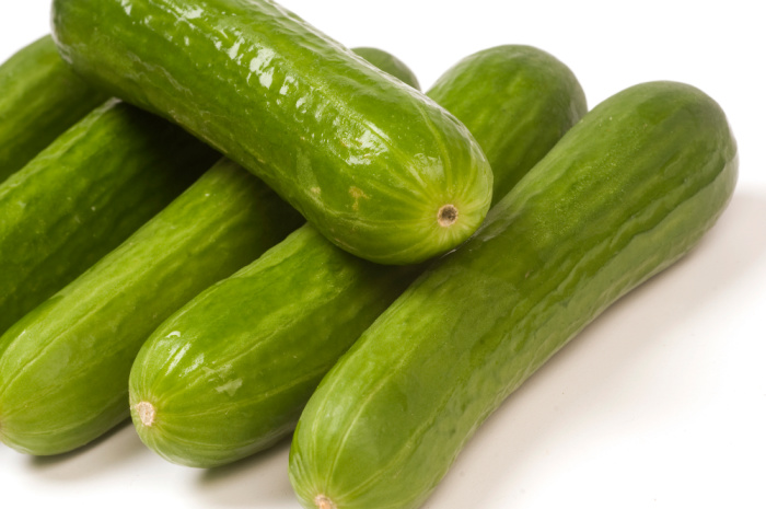 cucumbers on white background, baby cucumbers