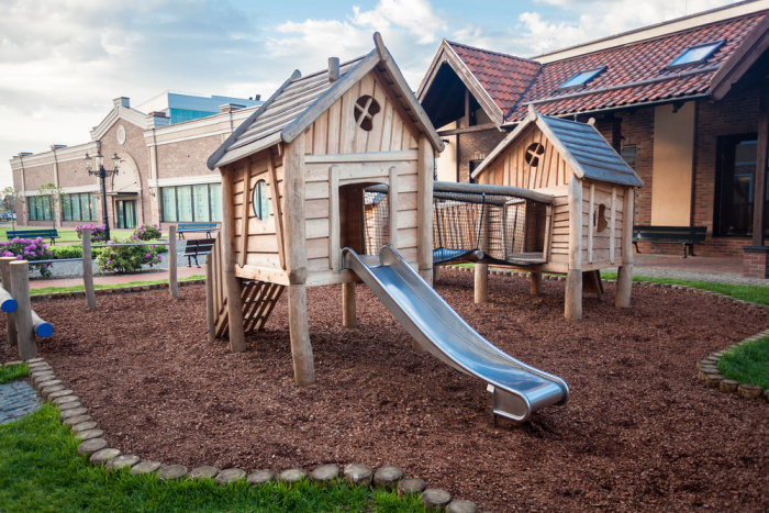 Outdoor shot of big wooden playground at shopping mall