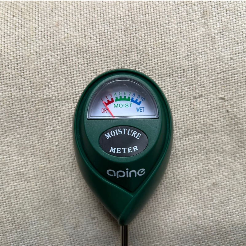 moisture meter on a textured background