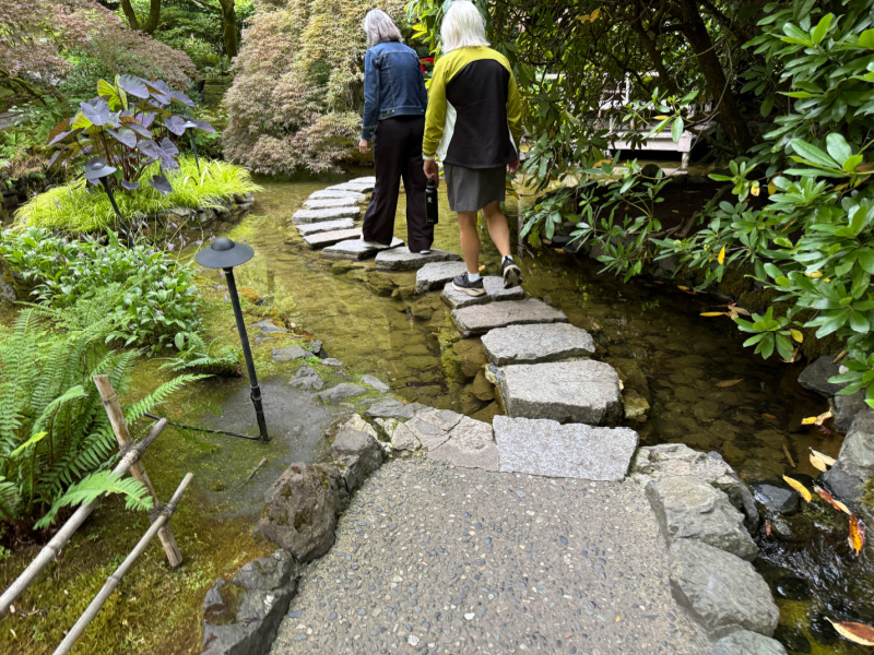 path at Butchart Garden going through pond